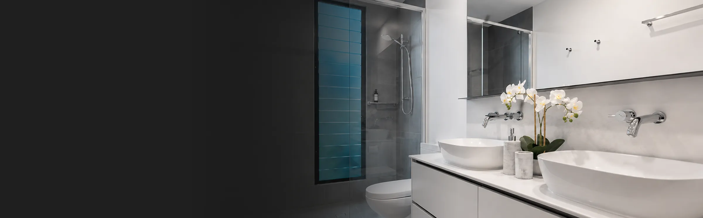 Luxury bathroom with vessel sinks and marble finishes