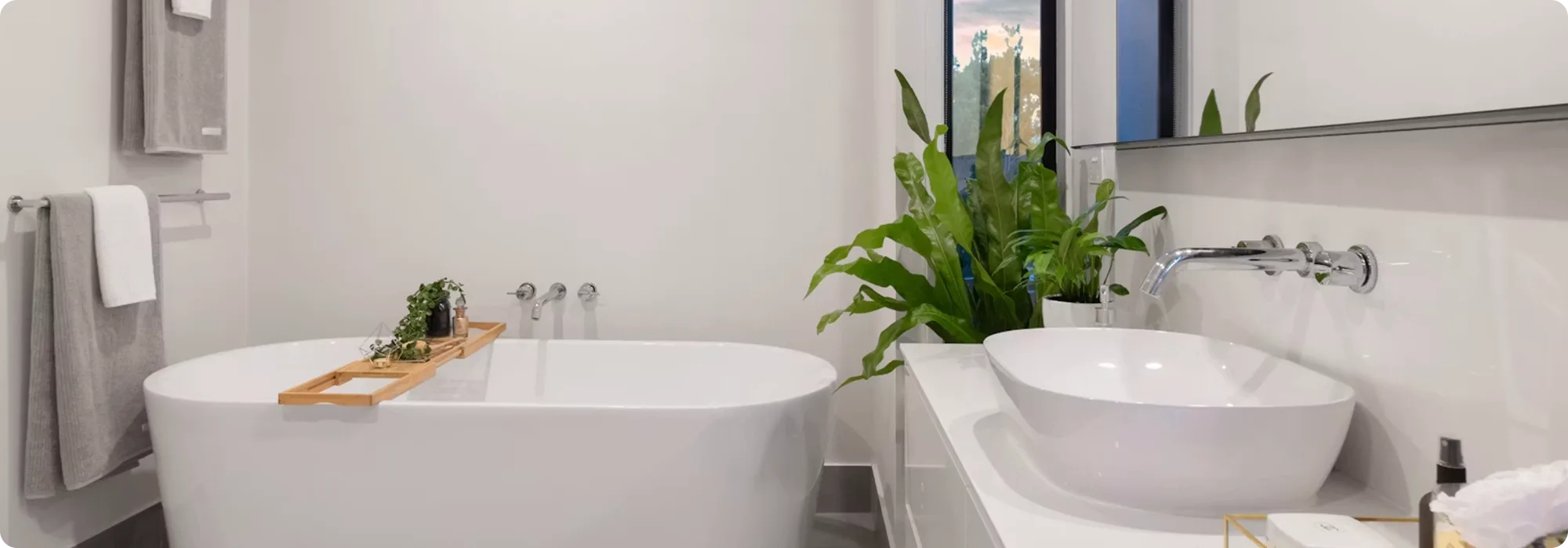 Minimalist bathroom with freestanding tub and vessel basin
