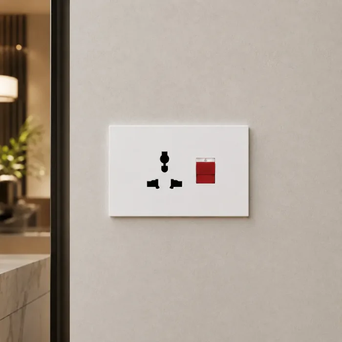 White plate combining a universal multi standard socket and a switch with a red pilot light