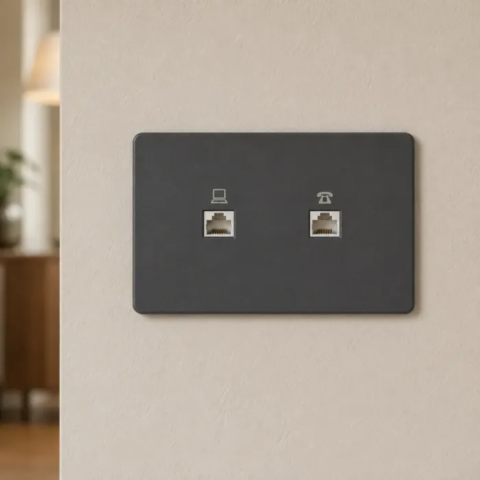 Matte graphite data plate with an RJ45 network port and an RJ11 telephone port