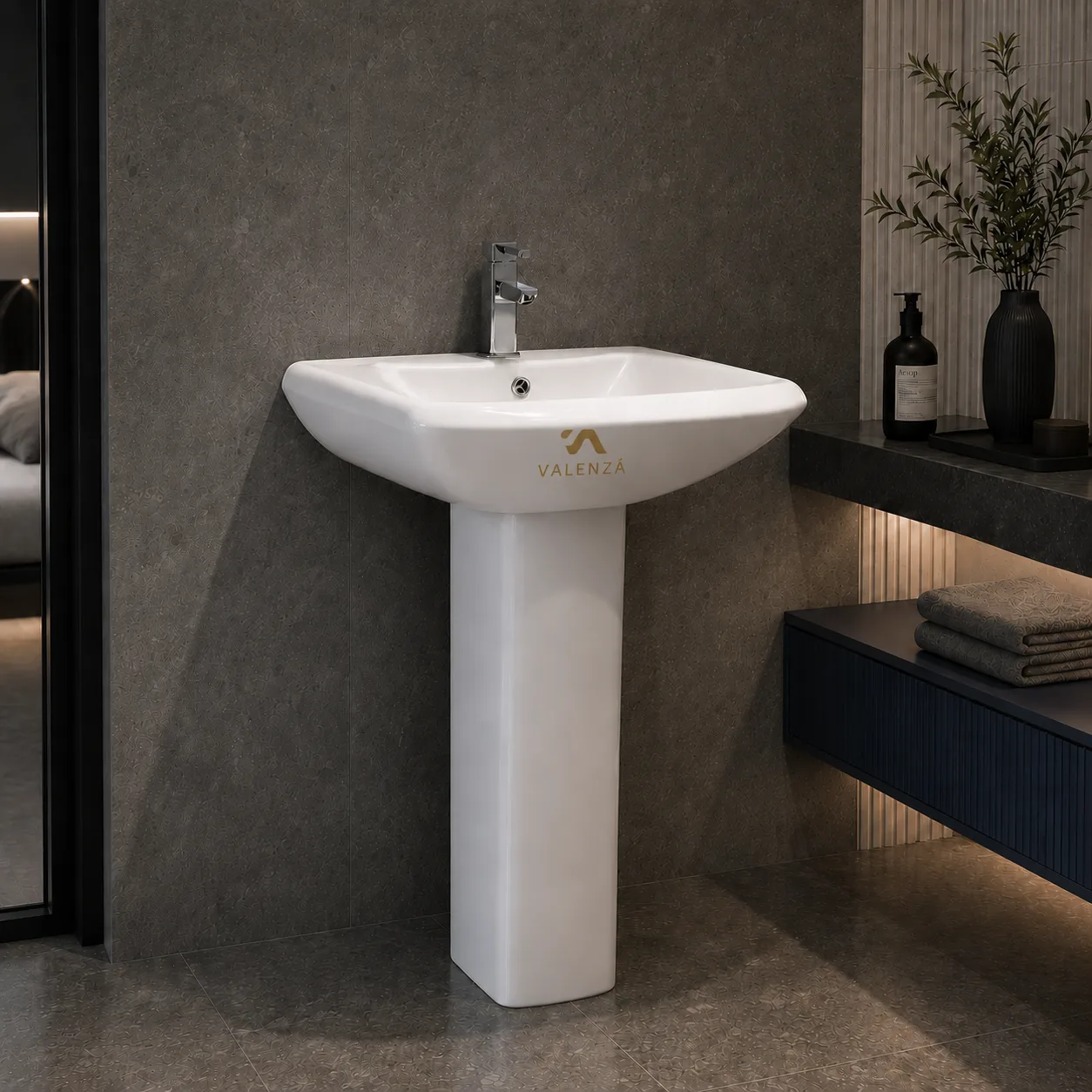 Pedestal basin with a softly squared bowl on a straight column in white ceramic