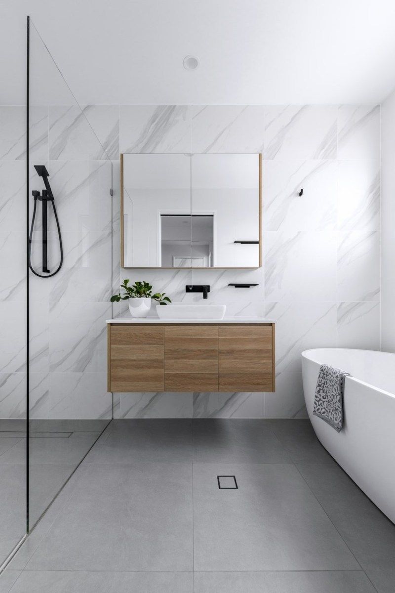 Marble-effect porcelain tiled bathroom
