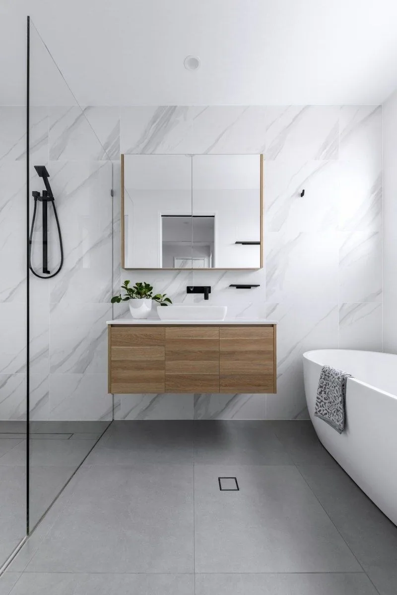 Marble-effect porcelain tiled bathroom